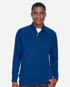 Devon & Jones DG440 Men’s Stretch Tech-Shell® Compass Quarter-Zip Pullover – True Royal (on model)