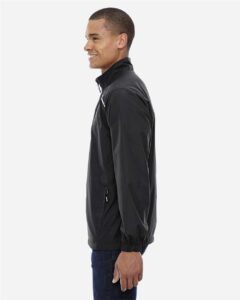 CORE365 88183T Men’s Tall Techno Lite Motivate Unlined Lightweight Jacket – Black (on model side)