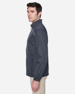 CORE365 88183T Men’s Tall Techno Lite Motivate Unlined Lightweight Jacket – Carbon (on model side)
