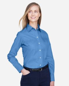 Devon & Jones D620W Women’s Crown Collection® Broadcloth Woven Dress Shirt – French Blue (on model side)