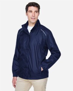 CORE365 88185 Men’s Climate Seam Sealed Lightweight Variegated Ripstop Jacket – Classic Navy (on model side)