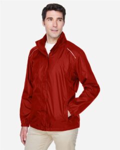CORE365 88185 Men’s Climate Seam Sealed Lightweight Variegated Ripstop Jacket – Classic Red (on model side)