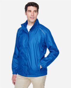 CORE365 88185 Men’s Climate Seam Sealed Lightweight Variegated Ripstop Jacket – True Royal (on model side)