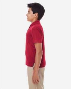CORE365 88181Y Youth Origin Performance Piqué Polo – Classic Red (on model side)