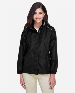 CORE365 78185 Women’s Climate Seam-Sealed Lightweight Variegated Ripstop Jacket – Black (on model)