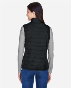 CORE365 CE702W Women’s Prevail Packable Puffer Vest – Black (on model back)