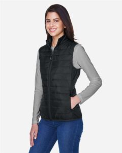 CORE365 CE702W Women’s Prevail Packable Puffer Vest – Black (on model side)