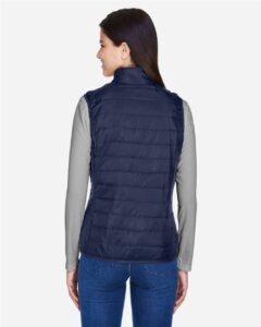 CORE365 CE702W Women’s Prevail Packable Puffer Vest – Classic Navy (on model back)
