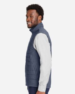 Devon & Jones DG706 Men’s New Classics® Charleston Hybrid Vest – Navy Melange/ Navy (on model side)