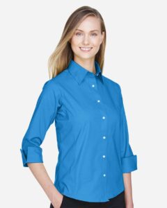 Devon & Jones DP625W Women’s Perfect Fit™ Three-Quarter Sleeve Stretch Poplin Dress Shirt – French Blue (on model side)