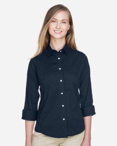 Devon & Jones DP625W Women’s Perfect Fit™ Three-Quarter Sleeve Stretch Poplin Dress Shirt – Navy (on model)