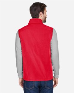 CORE365 CE701 Men’s Cruise Two-Layer Fleece Bonded Soft Shell Vest – Classic Red (on model back)