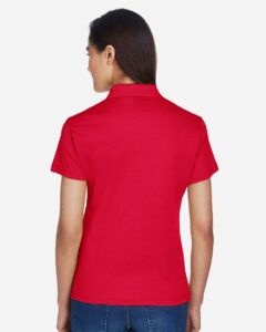 Devon & Jones DG200W Women’s Pima-Tech™ Jet Piqué Polo – Red (on model back)