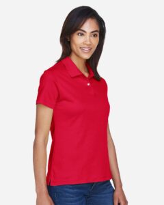 Devon & Jones DG200W Women’s Pima-Tech™ Jet Piqué Polo – Red (on model side)