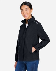 CORE365 CE712W Women’s Barrier Packable Rain Jacket – Black (on model side)