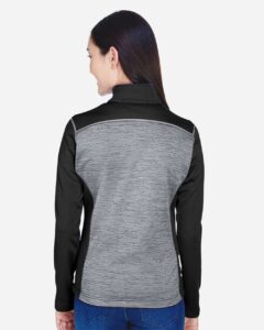Devon & Jones DG796W Women’s Newbury Colorblock Mélange Fleece Full-Zip Jacket – Black Heather/ Dark Grey Heather (on model back)
