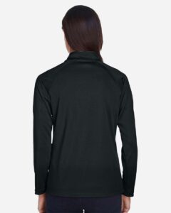 Devon & Jones DG440W Women’s Stretch Tech-Shell® Compass Quarter-Zip Pullover – Black (on model back)