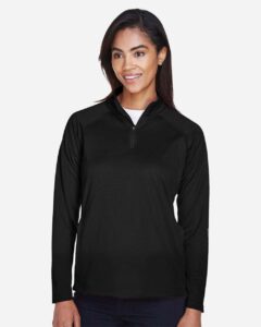 Devon & Jones DG440W Women’s Stretch Tech-Shell® Compass Quarter-Zip Pullover – Black (on model)