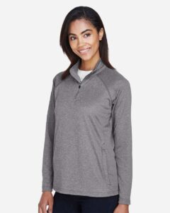 Devon & Jones DG440W Women’s Stretch Tech-Shell® Compass Quarter-Zip Pullover – Dark Grey Heather (on model side)