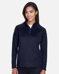 Devon & Jones DG440W Women’s Stretch Tech-Shell® Compass Quarter-Zip Pullover – Navy (on model)