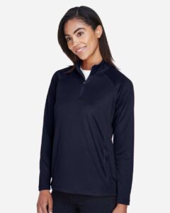 Devon & Jones DG440W Women’s Stretch Tech-Shell® Compass Quarter-Zip Pullover – Navy (on model side)