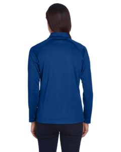 Devon & Jones DG440W Women’s Stretch Tech-Shell® Compass Quarter-Zip Pullover – True Royal (on model back)