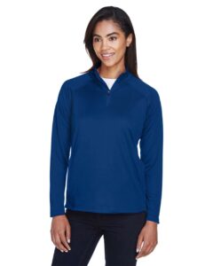 Devon & Jones DG440W Women’s Stretch Tech-Shell® Compass Quarter-Zip Pullover – True Royal (on model)