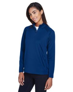 Devon & Jones DG440W Women’s Stretch Tech-Shell® Compass Quarter-Zip Pullover – True Royal (on model side)