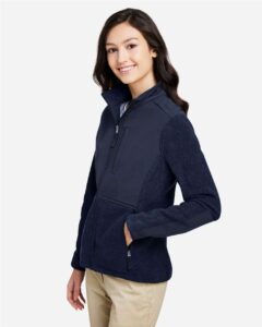 CORE365 CE890W Women’s Journey Summit Hybrid Full-Zip – Classic Navy/ Classic Navy (on model side)