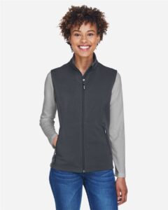 CORE365 CE701W Women’s Cruise Two-Layer Fleece Bonded Soft Shell Vest – Carbon (on model)