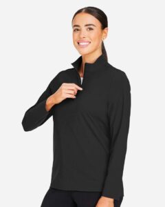 Devon & Jones DG410W Women’s CrownLux Performance® Windsor Welded Quarter-Zip Pullover – Black (on model side)