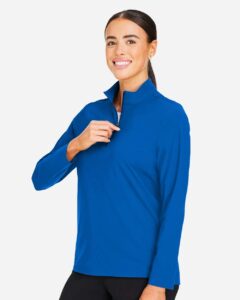 Devon & Jones DG410W Women’s CrownLux Performance® Windsor Welded Quarter-Zip Pullover – French Blue (on model side)