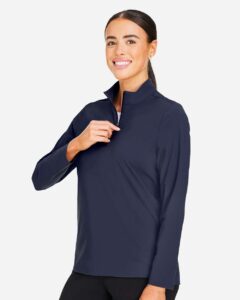 Devon & Jones DG410W Women’s CrownLux Performance® Windsor Welded Quarter-Zip Pullover – Navy (on model side)