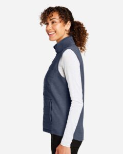 Devon & Jones DG706W Women’s New Classics® Charleston Hybrid Vest – Navy Melange/ Navy (on model side)