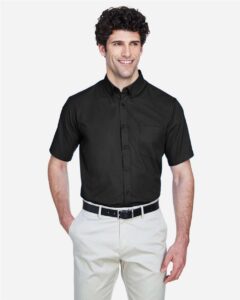 CORE365 88194T Men’s Tall Optimum Short Sleeve Twill Dress Shirt – Black (on model)