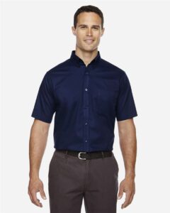 CORE365 88194T Men’s Tall Optimum Short Sleeve Twill Dress Shirt – Classic Navy (on model)