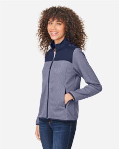 CORE365 CE74W Women’s Venture Heathered Stripe Hybrid Jacket – Classic Navy/ White (on model side)