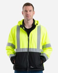 Berne Apparel HVJS206 Men’s Hi-Vis Class 3 Hooded Soft Shell Jacket – Yellow (on model)