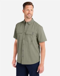 HUK H150183 Men’s Creekbed Short Sleeve Shirt – Moss (on model side)