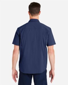 HUK H150183 Men’s Creekbed Short Sleeve Shirt – Naval Academy (on model back)