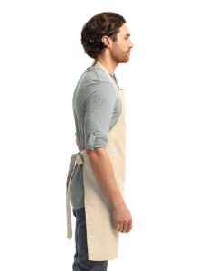 Artisan Collection by Reprime RP150 Recycled Bib Apron – Natural (on model side)