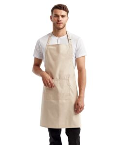 Artisan Collection by Reprime RP154 Recycled Pocket Bib Apron – Natural (on model)