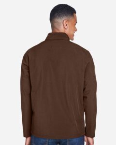 Team 365 TT80 Men’s Leader Soft Shell Jacket – Sport Dark Brown (on model back)