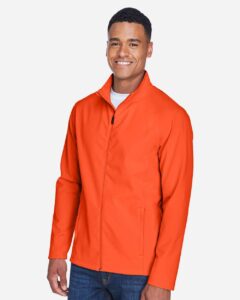 Team 365 TT80 Men’s Leader Soft Shell Jacket – Sport Orange (on model side)