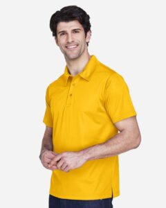 Team 365 TT21 Men’s Command Snag Protection Polo – Sport Athletic Gold (on model side)