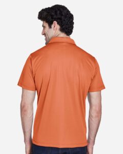 Team 365 TT21 Men’s Command Snag Protection Polo – Sport Burnt Orange (on model back)
