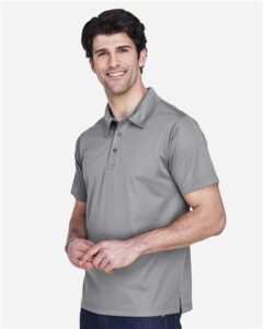 Team 365 TT21 Men’s Command Snag Protection Polo – Sport Graphite (on model side)