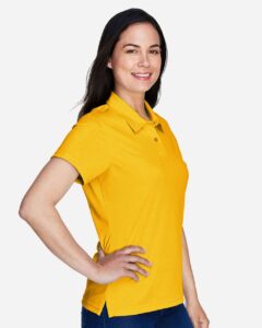 Team 365 TT21W Women’s Command Snag Protection Polo – Sport Athletic Gold (on model side)