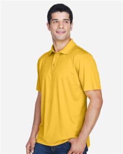 Harriton M315 Men’s Polyester Jersey Polo – Gold (on model side)