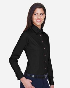 Harriton M500W Women’s Easy Blend™ Twill Dress Shirt with Stain-Release – Black (on model side)